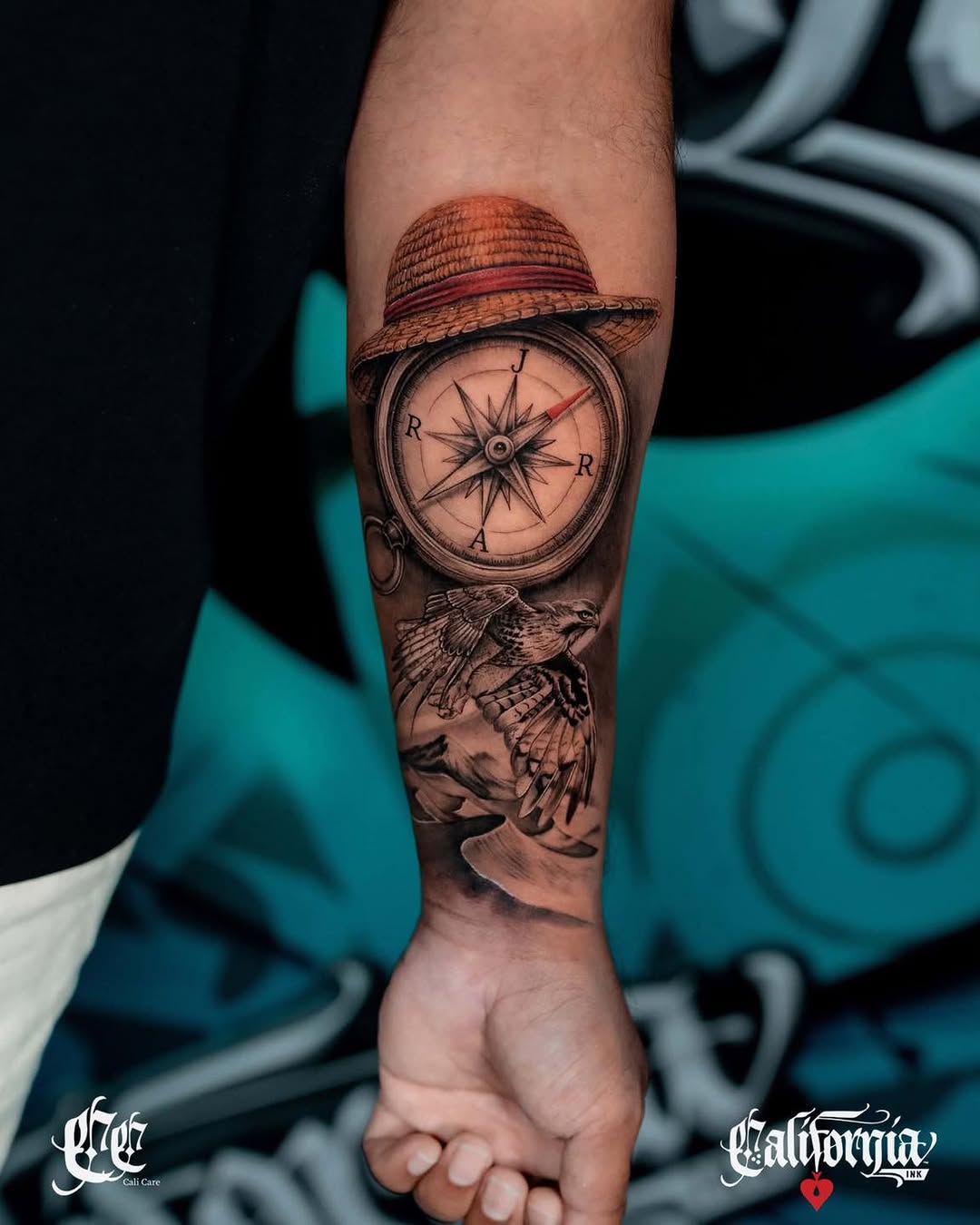 Compass with straw hat and eagle on forearm, rendered in black and grey with smooth shading and realistic detail.