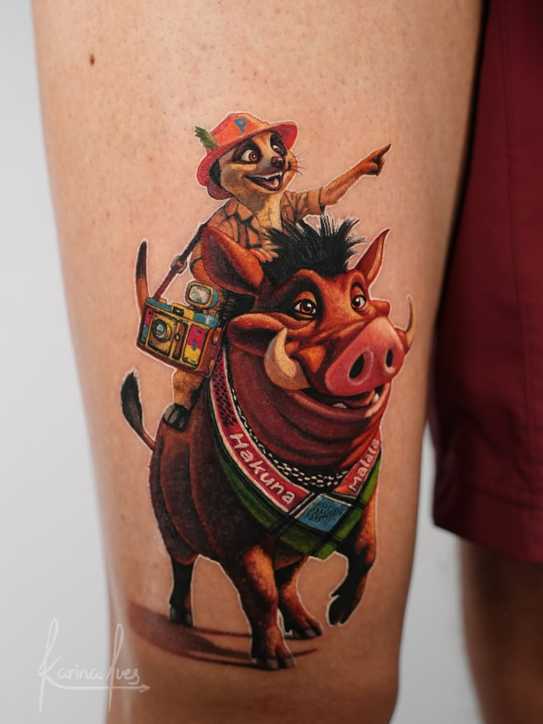 Cartoonish cowboy character riding a red bull with exaggerated features and saturated colors on thigh.